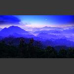 山峦层叠晓月朦