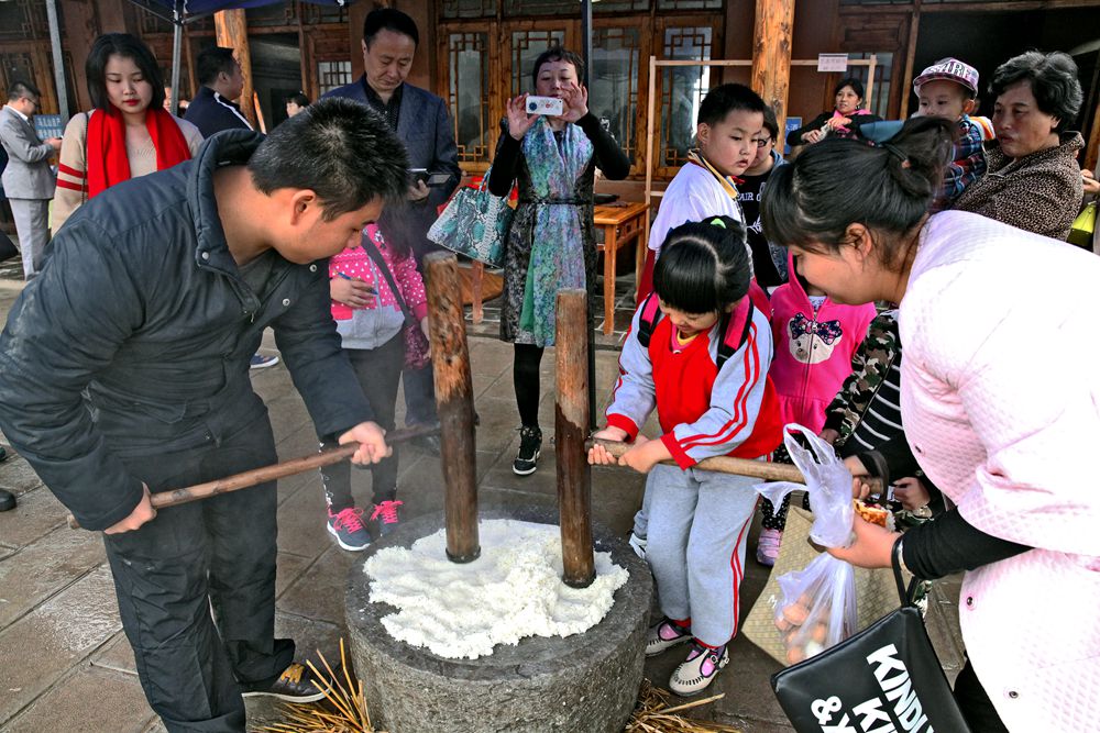 我邦妈妈打滋粑